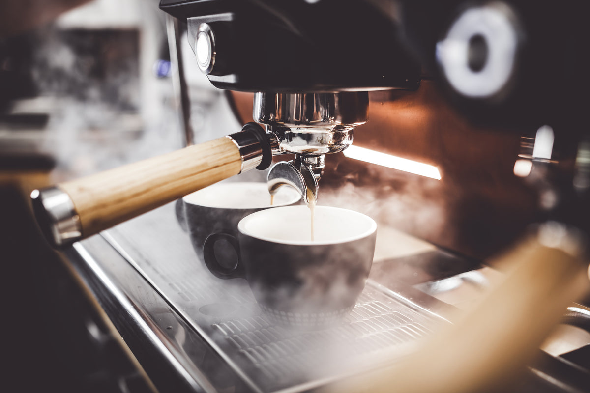 3-piece-canvas-print-steaming-coffee-machine