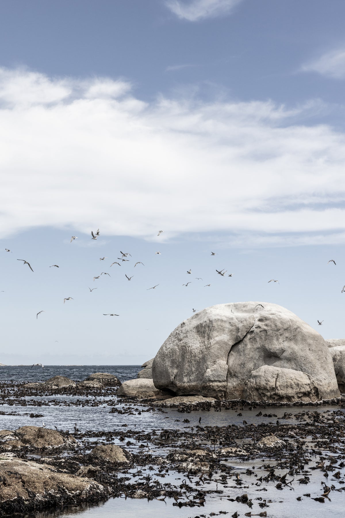 acrylic-print-rocky-seashore-under-a-clear-sky