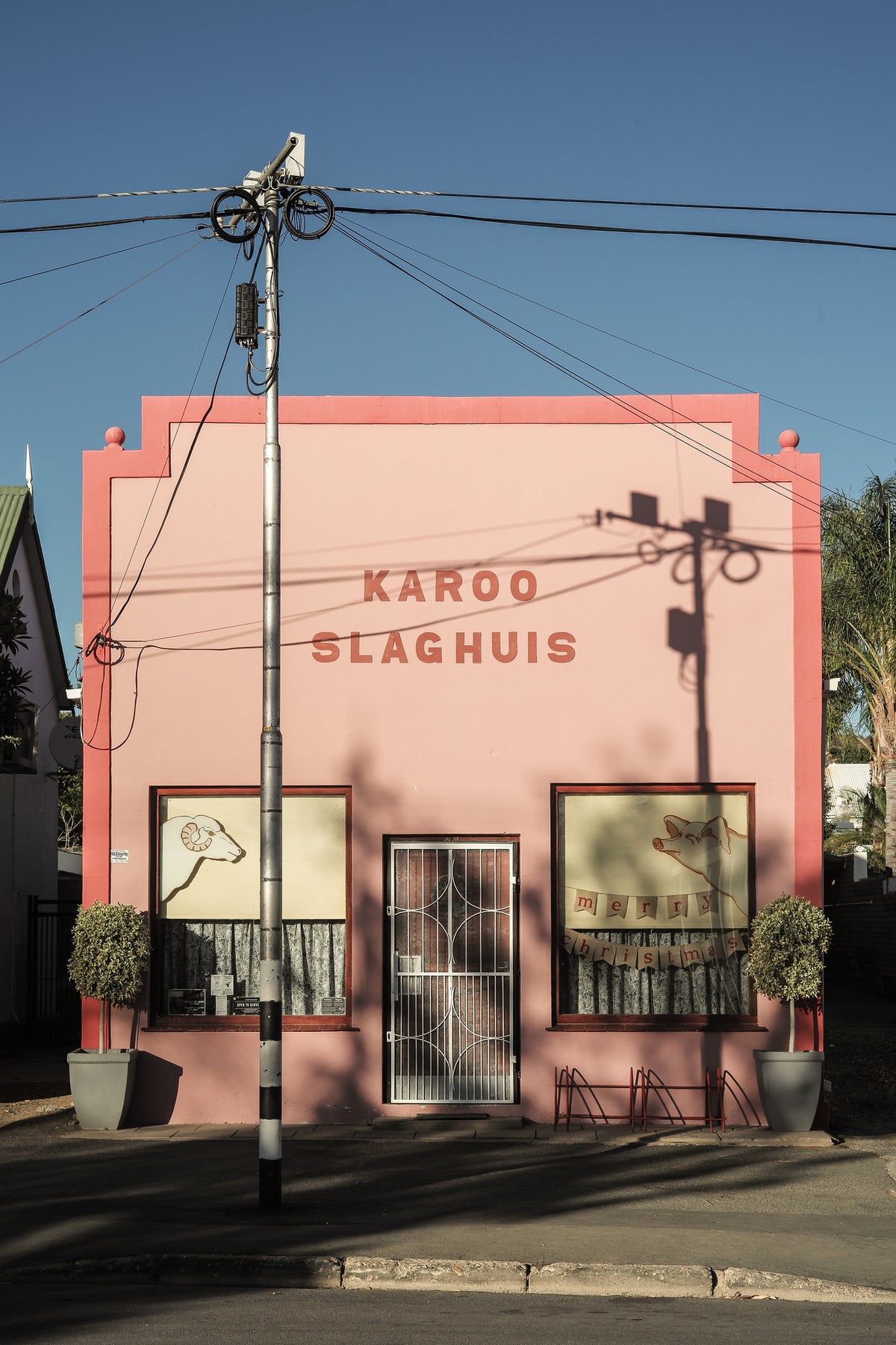 acrylic-print-a-charming-pink-butcher-shop