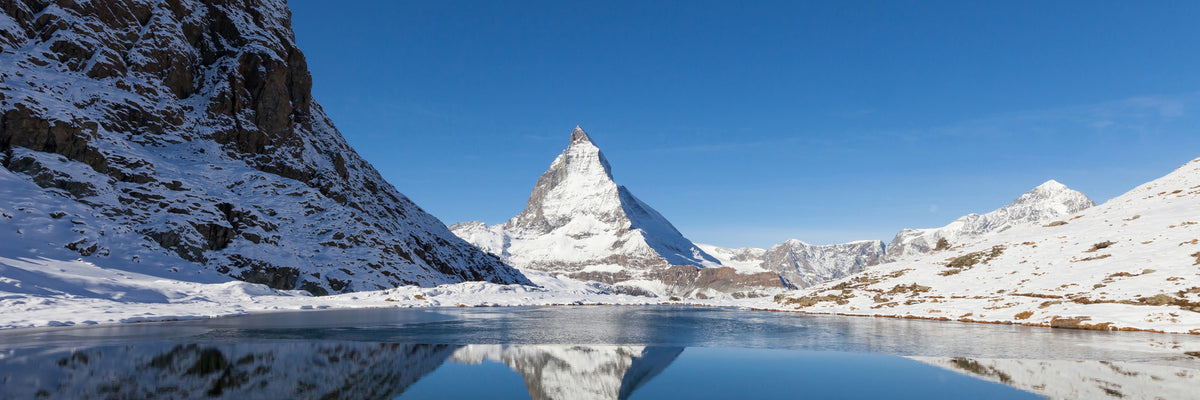 panoramic-canvas-print-the-riffelsee-on-matterhorn-panorama