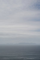 framedposter-print-tranquil-ocean-and-distant-horizon-under-a-clouded-sky