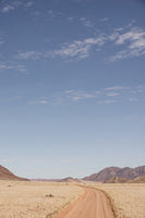 framedcanvas-print-vast-desert-road-under-a-clear-blue-sky