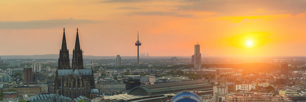 panoramic-canvas-print-skyline-cologne-at-sunset-panorama