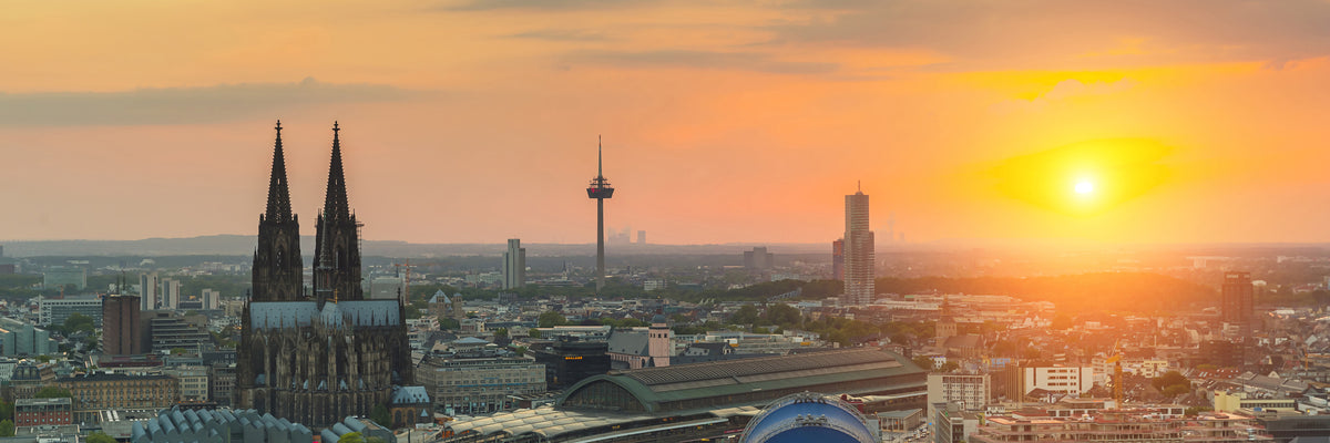 panoramic-canvas-print-skyline-cologne-at-sunset-panorama