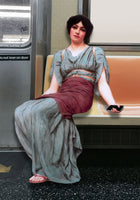 acrylic-print-a-woman-in-ancient-attire-seated-in-a-subway