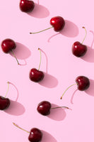 framedcanvas-print-cherries-on-pink-background