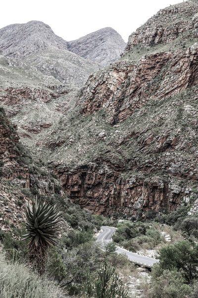 poster-print-mountain-road-through-a-rugged-canyon-landscape